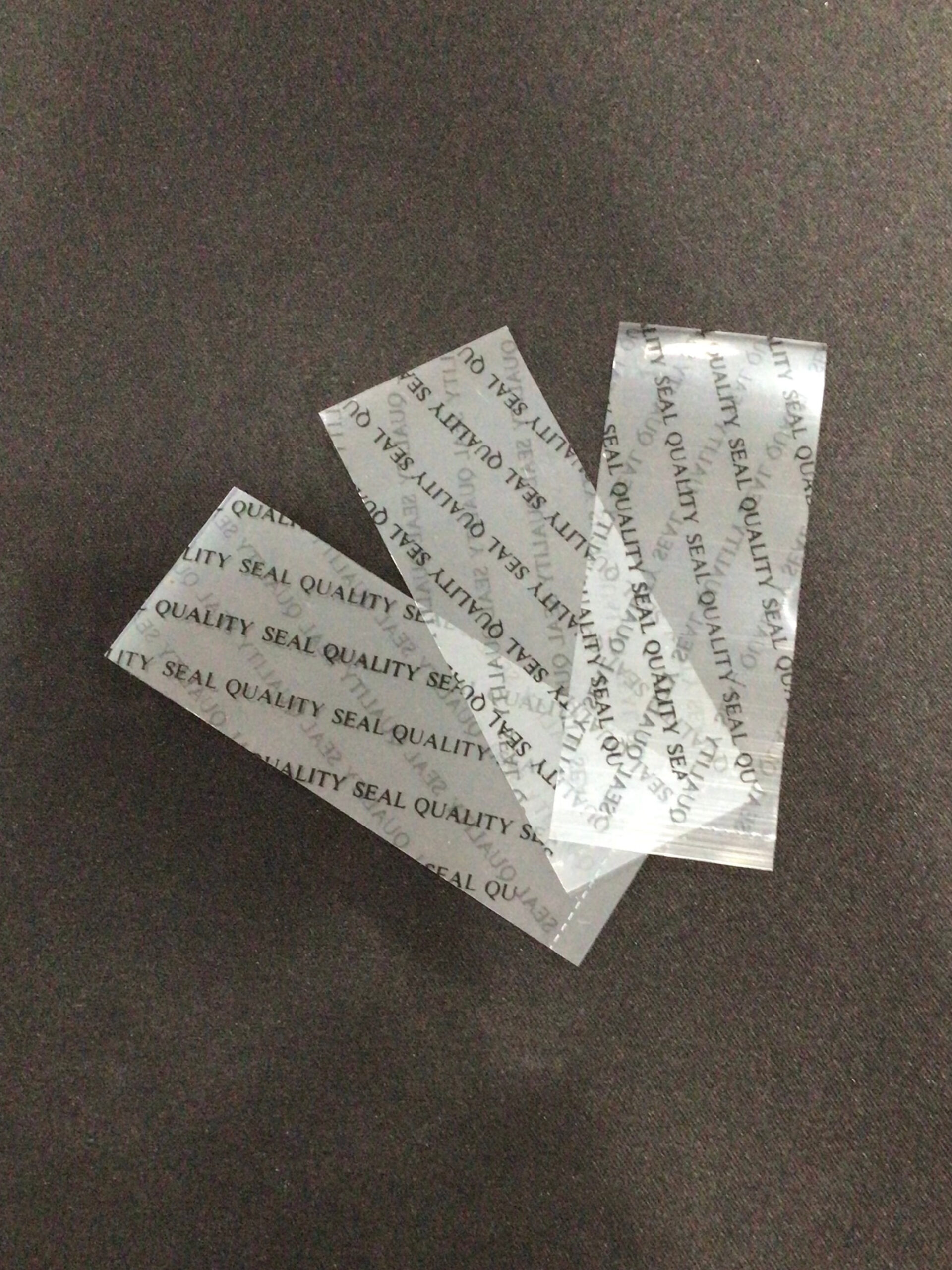 Printed Shrink Bands | Perforated (Red or Black on Clear)